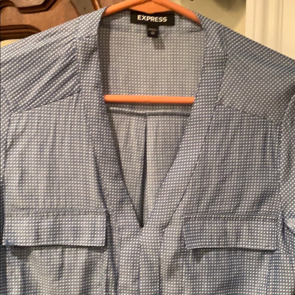 Blue with white polka dot pull over dress shirt.